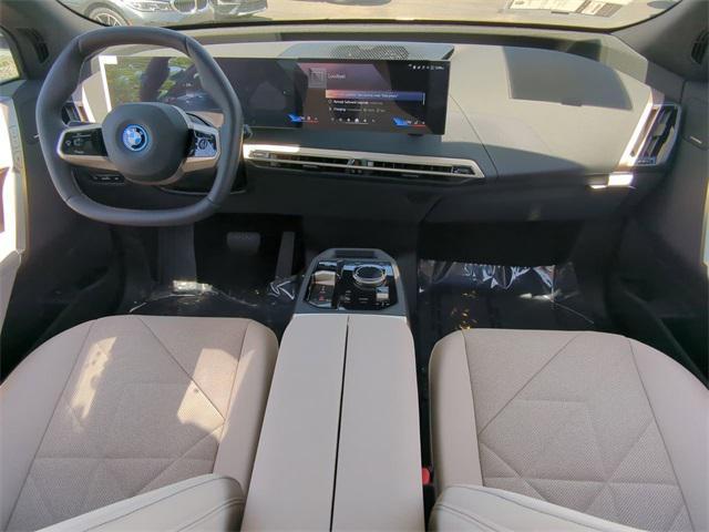 new 2025 BMW iX car, priced at $96,825