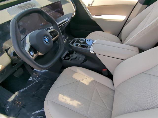 new 2025 BMW iX car, priced at $96,825