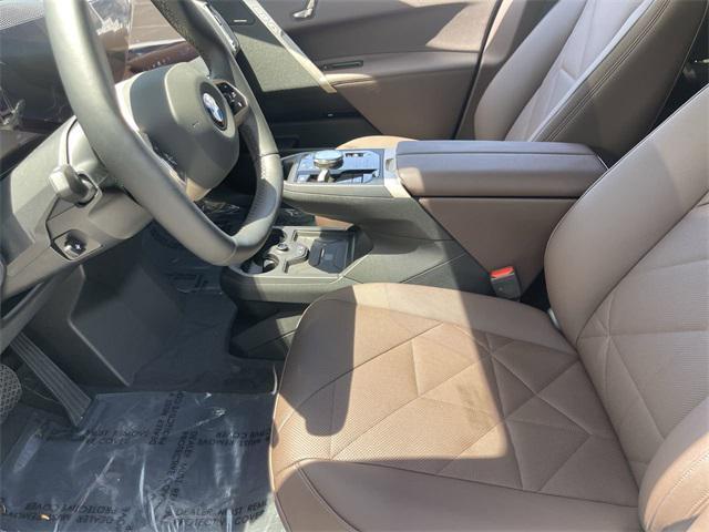 new 2026 BMW iX car, priced at $88,325