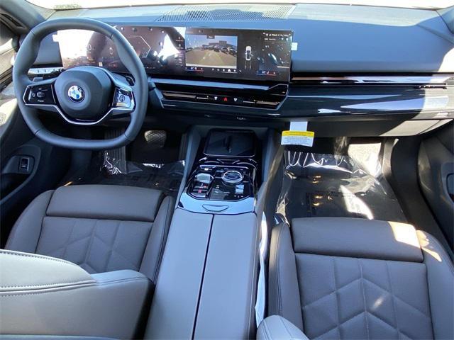 new 2025 BMW 530 car, priced at $61,425
