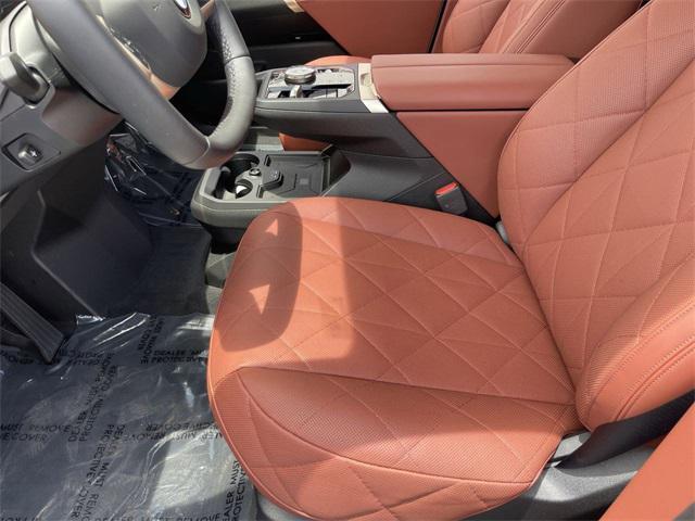 new 2026 BMW iX car, priced at $91,825