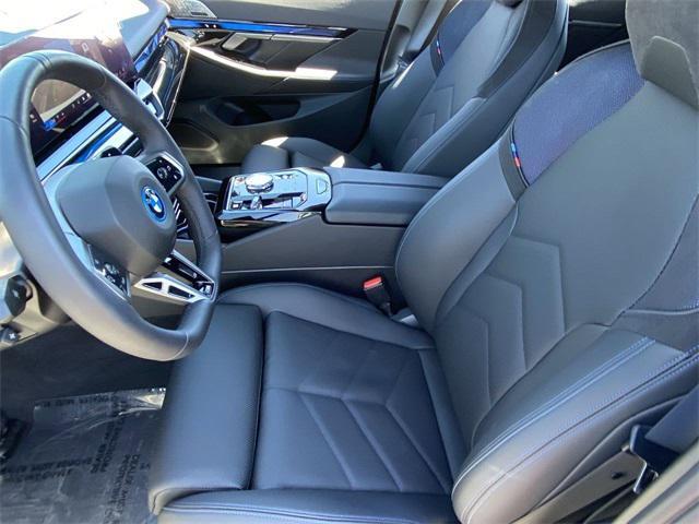 used 2026 BMW 550e car, priced at $68,466