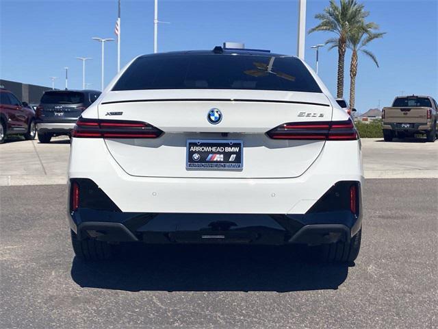 used 2026 BMW 550e car, priced at $68,466