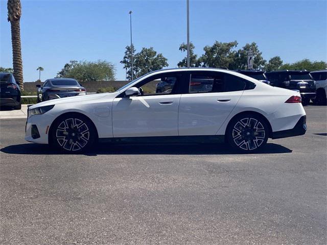 used 2026 BMW 550e car, priced at $68,466
