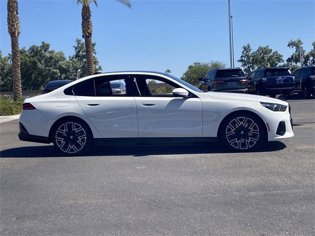 used 2026 BMW 550e car, priced at $68,466