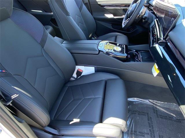 used 2026 BMW 550e car, priced at $68,466