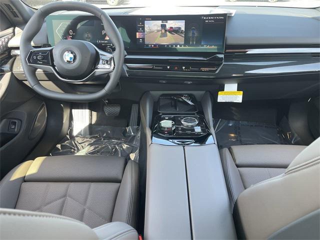 new 2025 BMW 530 car, priced at $62,675