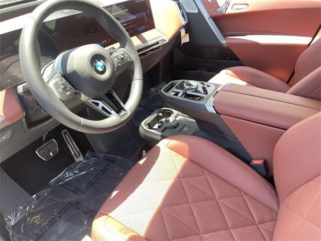new 2026 BMW iX car, priced at $111,225