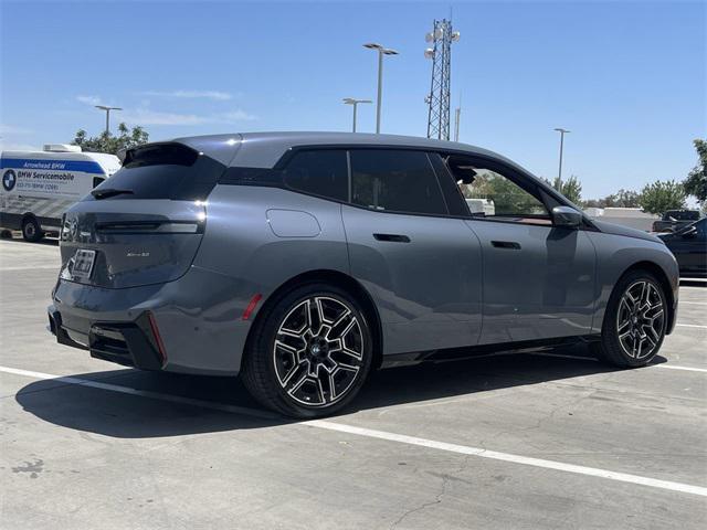 new 2026 BMW iX car, priced at $111,225