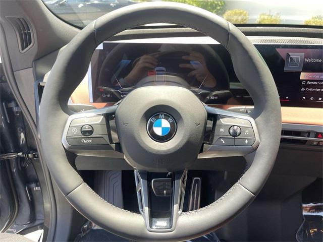 new 2026 BMW iX car, priced at $111,225