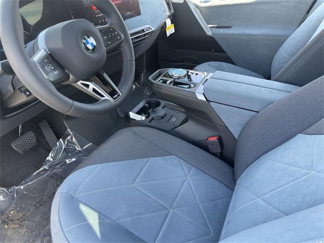 new 2025 BMW iX car, priced at $117,155