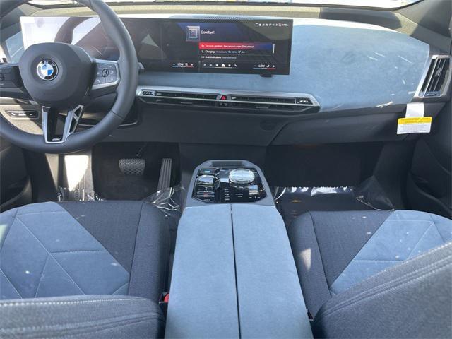 new 2025 BMW iX car, priced at $117,155