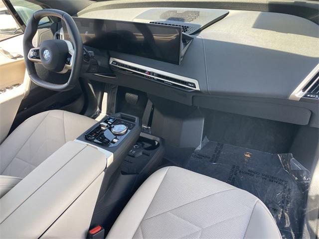 new 2025 BMW iX car, priced at $93,525