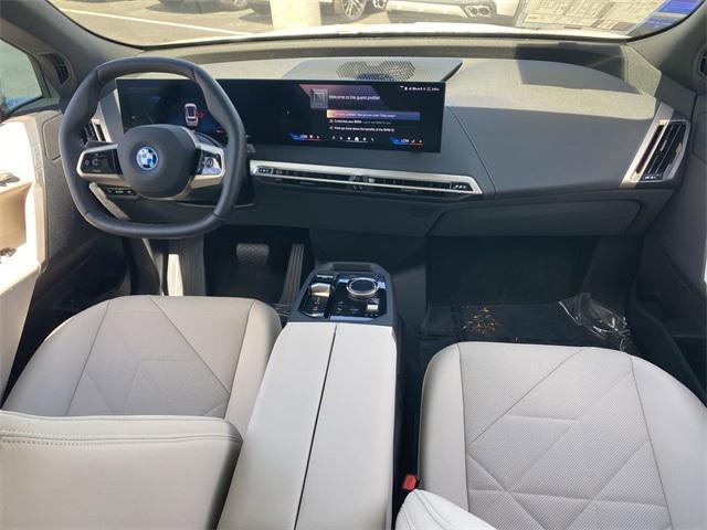 new 2025 BMW iX car, priced at $93,525