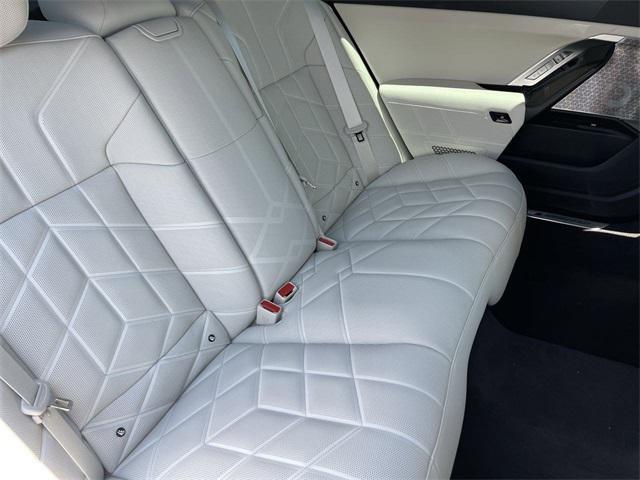 new 2025 BMW 740 car, priced at $111,075