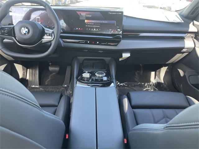 new 2025 BMW 530 car, priced at $61,575