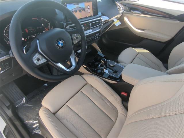 new 2025 BMW X4 car, priced at $60,985