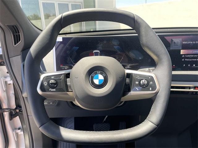 new 2026 BMW iX car, priced at $93,675