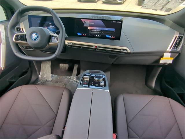 new 2025 BMW iX car, priced at $98,775