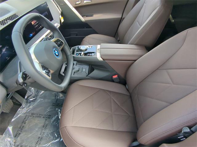 new 2025 BMW iX car, priced at $98,775