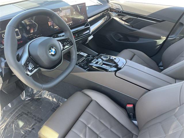 new 2025 BMW 530 car, priced at $63,175