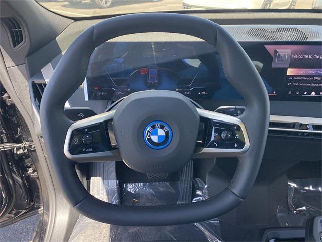 new 2025 BMW iX car, priced at $96,325