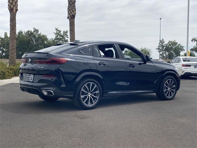used 2024 BMW X6 car, priced at $63,487