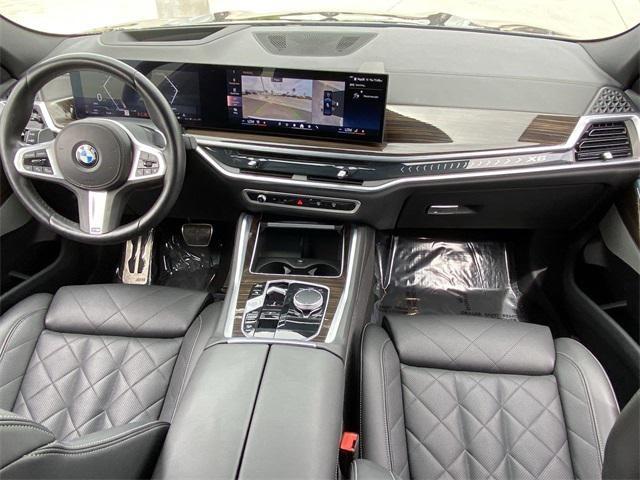used 2024 BMW X6 car, priced at $63,487