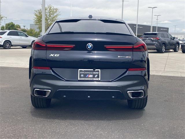 used 2024 BMW X6 car, priced at $63,487