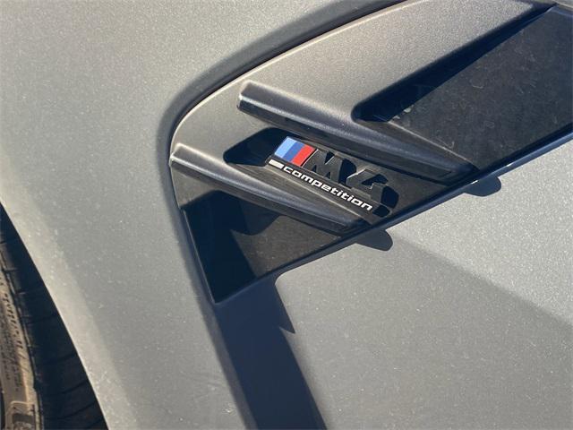 used 2022 BMW M4 car, priced at $74,490