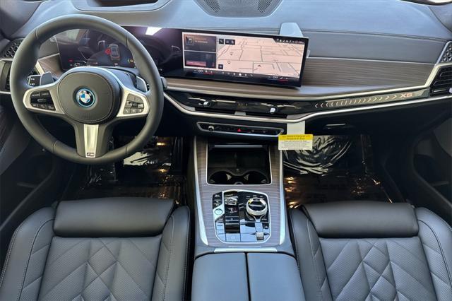 new 2026 BMW X5 PHEV car, priced at $87,700