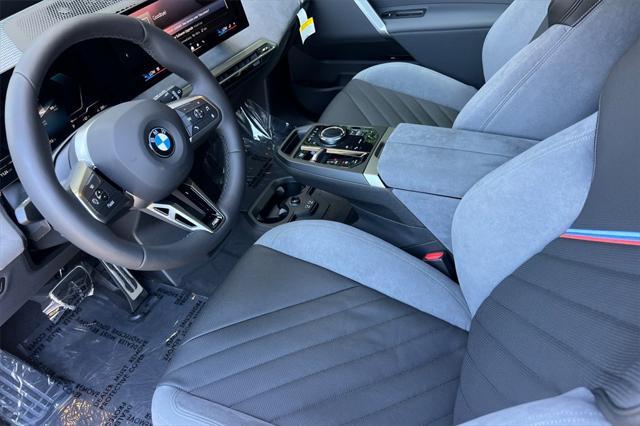 new 2026 BMW iX car, priced at $106,370