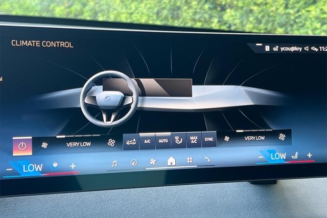 new 2026 BMW iX car, priced at $106,370