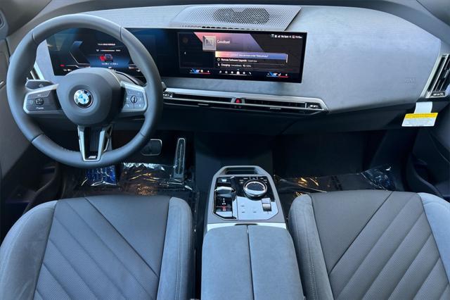 new 2026 BMW iX car, priced at $103,170