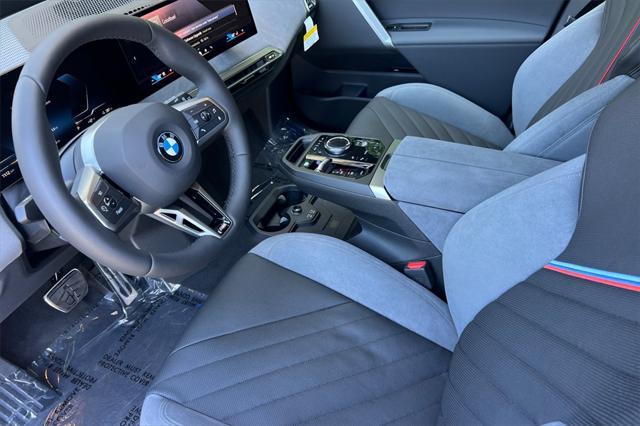 new 2026 BMW iX car, priced at $103,170