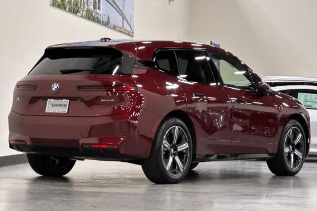 new 2026 BMW iX car, priced at $79,870
