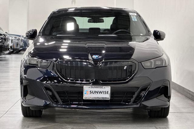 used 2024 BMW i5 car, priced at $64,000