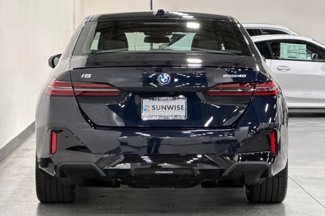 used 2024 BMW i5 car, priced at $64,000