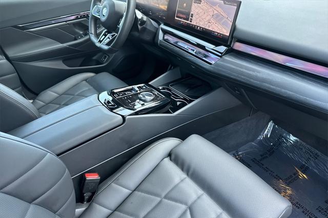 used 2024 BMW i5 car, priced at $64,000