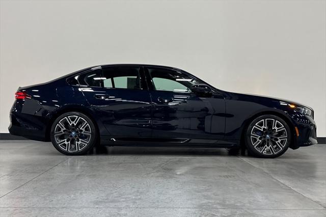 used 2024 BMW i5 car, priced at $64,000