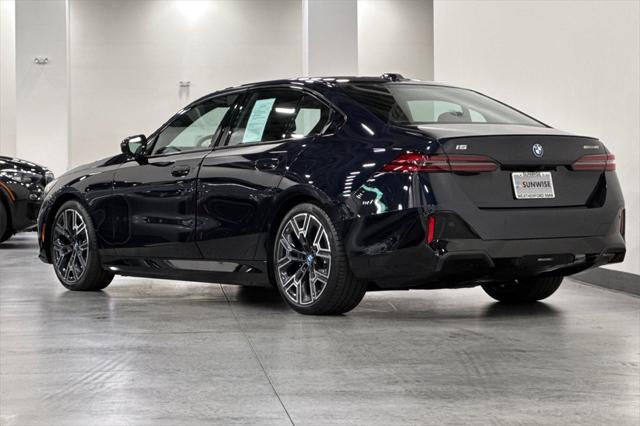 used 2024 BMW i5 car, priced at $64,000