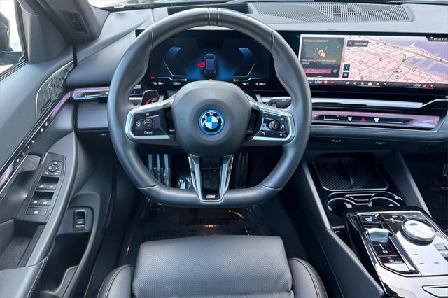 used 2024 BMW i5 car, priced at $64,000