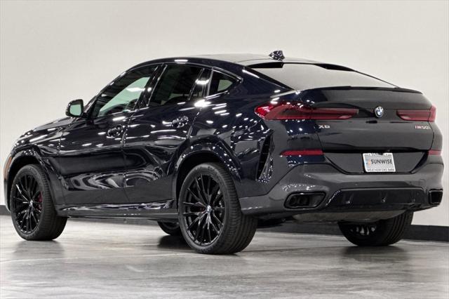 used 2022 BMW X6 car, priced at $62,500