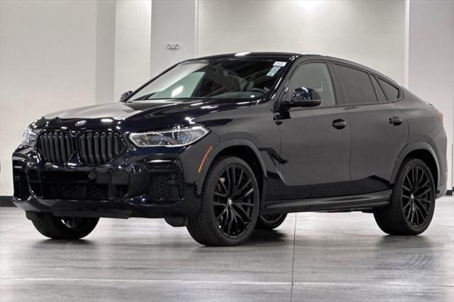 used 2022 BMW X6 car, priced at $62,500