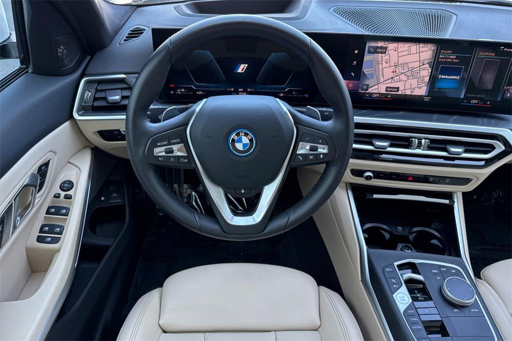 used 2023 BMW 330e car, priced at $34,000
