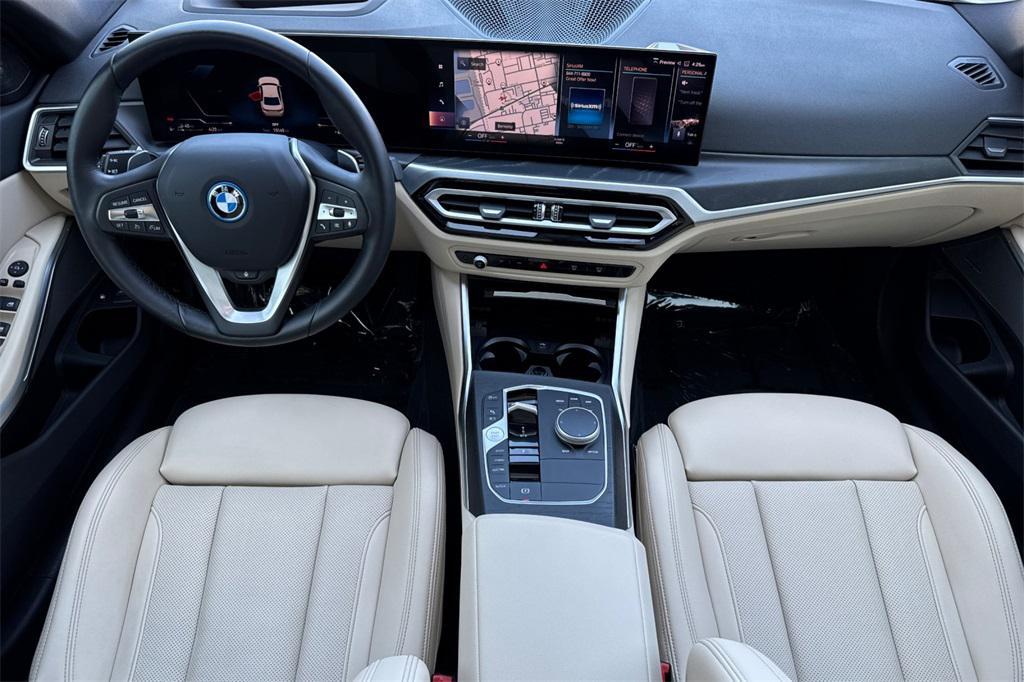 used 2023 BMW 330e car, priced at $34,000