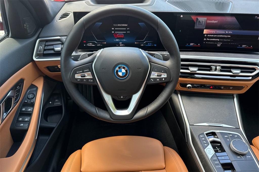used 2024 BMW 330e car, priced at $37,500