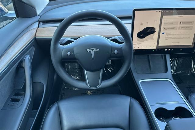 used 2023 Tesla Model 3 car, priced at $31,000