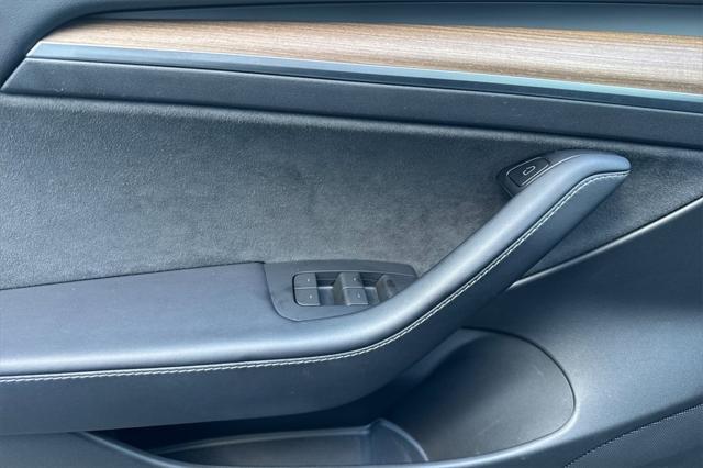 used 2023 Tesla Model 3 car, priced at $31,000