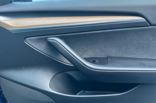used 2023 Tesla Model 3 car, priced at $31,000